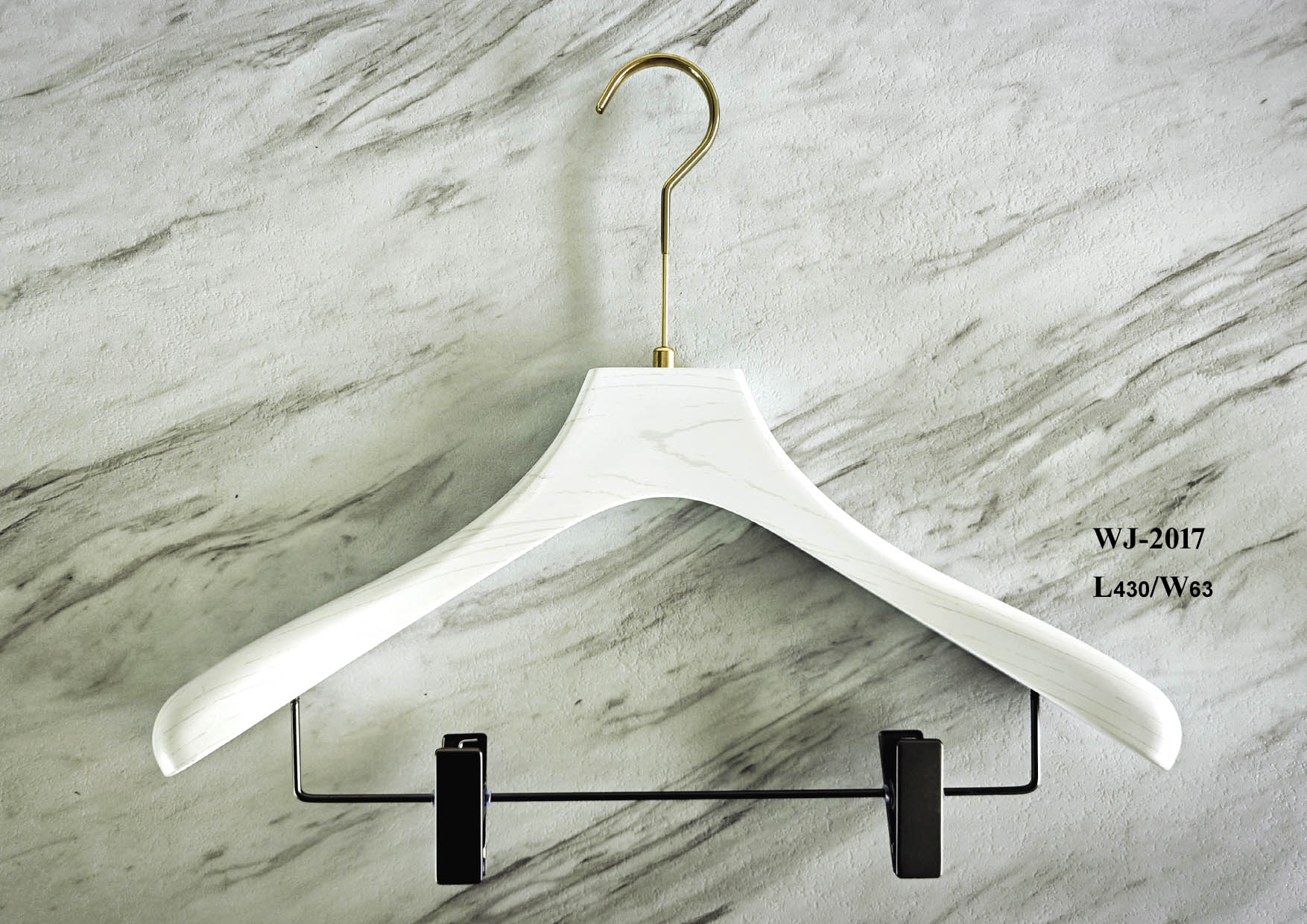 White plastic hanger with trouser clips from the supplied catalog